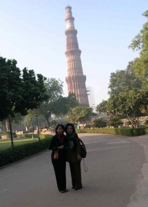 Qutb Minar tower at the back ground